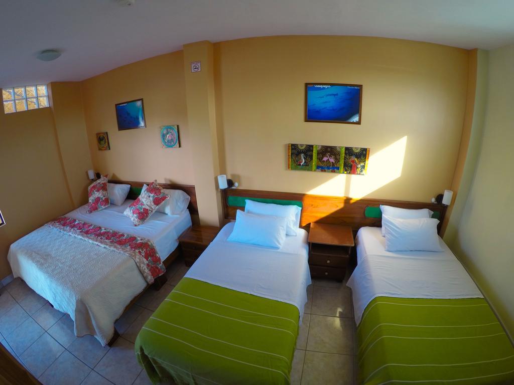 Dolphin House Hotel Пуерто Бакерисо Морено Екстериор снимка