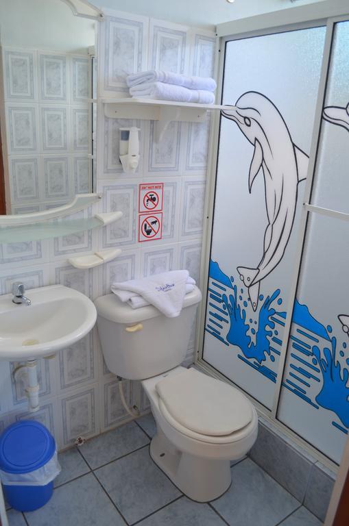 Dolphin House Hotel Пуерто Бакерисо Морено Екстериор снимка